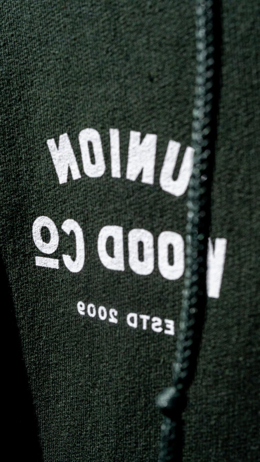 graphic on forest green hoodie